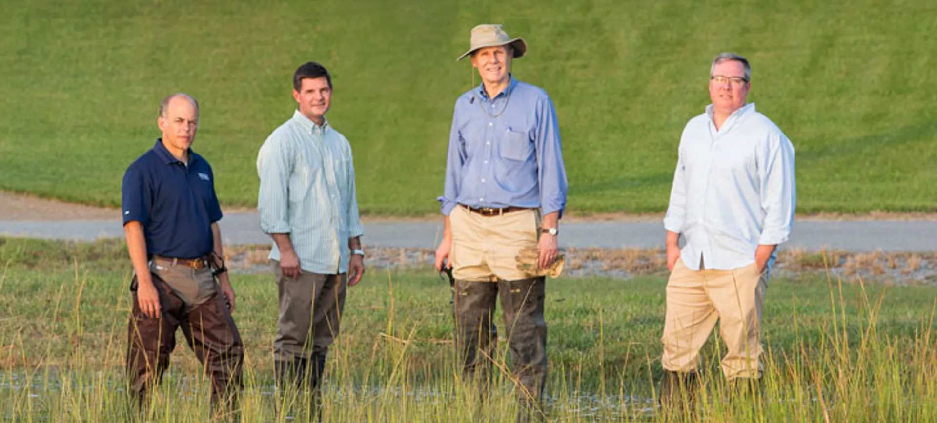 Men In A Field